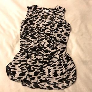 FREE w/any 2 purchases. Black & white dress top.